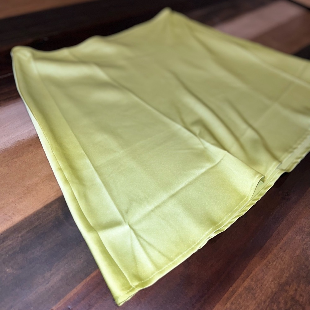 Green satin mini skirt